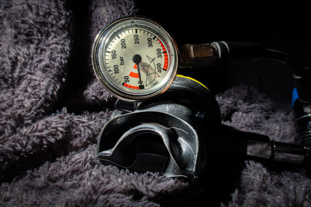 Scuba diving pressure gauge and a second stage air regulator close up.の写真素材