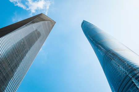 a part of modern business building against blue skyの写真素材