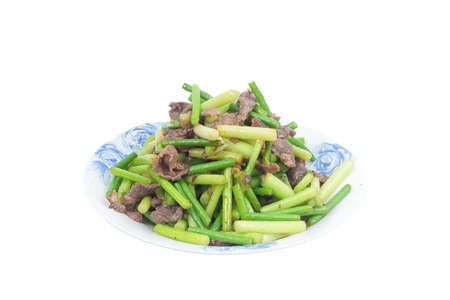 Stir-fried beef with garlic mossの写真素材