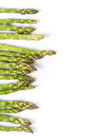 green asparagus isolated on white backgroundの写真素材