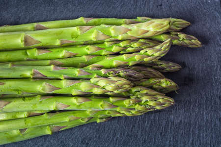 Fresh green asparagus on whiteの写真素材