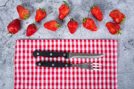 Fresh strawberry juice on glass with christmas hatの写真素材