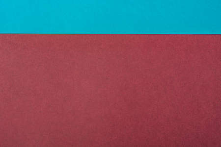 Blue and pink pastel color paper geometric flat lay backgroundの写真素材