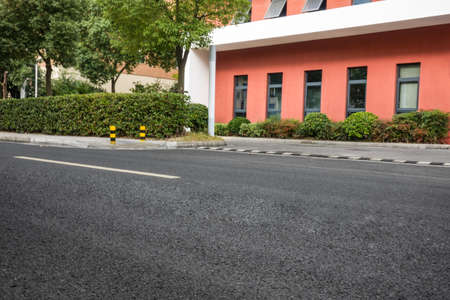 empty brick floor with modern building in background