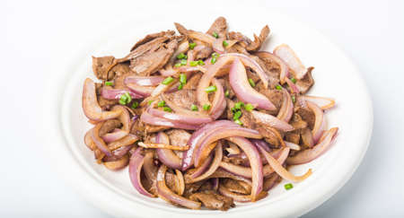 Fried pork liver with onionの写真素材