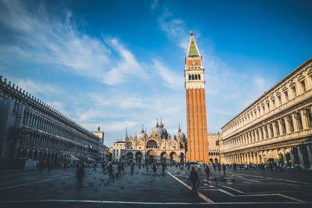 VENICE, ITALY - May 22, 2019: Silhouettes of people at Piazza (Square) San Marco with the Basilica...