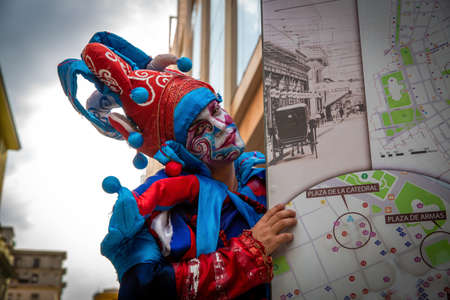 Havana / Cuba - 04.16.2015: Colorful stilt walker posing during the International Festival of Dance in Urban Landscapes "Old Havana, City in Motion"のeditorial素材