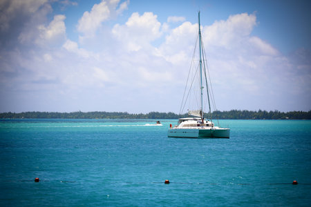 Sailing boat on the turquoise water of the Caribbean sea