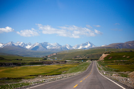 Beautiful view of the road in the grassland of Tibet.