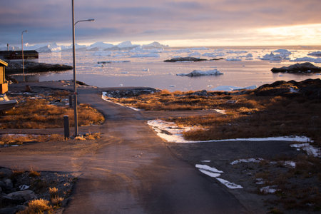 Icelandic landscape with a road and mountains in the background.の写真素材