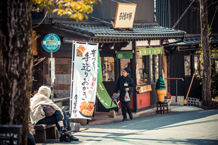 Unidentified people on the street of Tokyo, Japan. Tokyo is the capital of Japan and the most populous metropolitan area in the worldの写真素材
