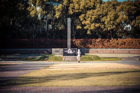 Unidentified people walking in the park.の写真素材