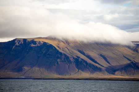 Icelandic landscape with mountains, fjord and sea.の写真素材