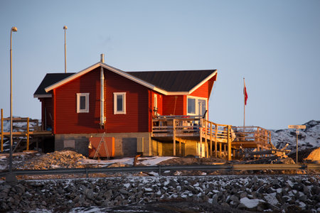 Red wooden house on Lofoten islands, Norway in winterの写真素材