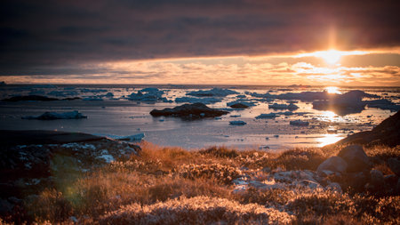 Icelandic landscape with icebergs at sunset. Long exposure.