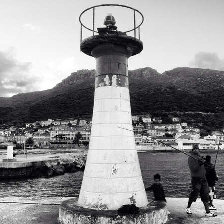 Fisherman at kalk bay harbourの素材