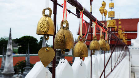 Buddhist bells inside the templeの写真素材
