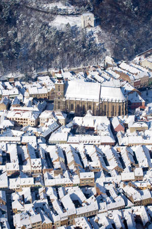 Aerial view of the gothic Black Church and defence White Tower, Brasov, Romaniaの写真素材