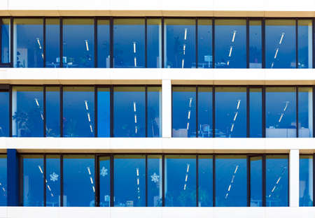 Modern office building detail with transparent glass wall