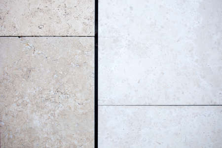 Beige travertine decorative tiles on a wallの写真素材