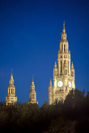 Gothic building tower of Vienna city hall, Rathause, at night, Austriaの写真素材