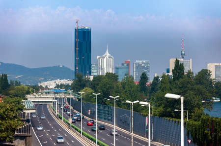 Vienna city highway  with Reichsbruecke (Empire Bridge) and the brand new DC-Tower, Austriaの写真素材
