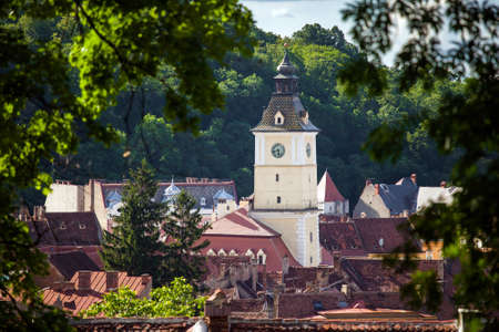 Brasov, Romania - June 9, 2013: Old Brasov city buildings roof  and The Council House clock tower, Romaniaのeditorial素材