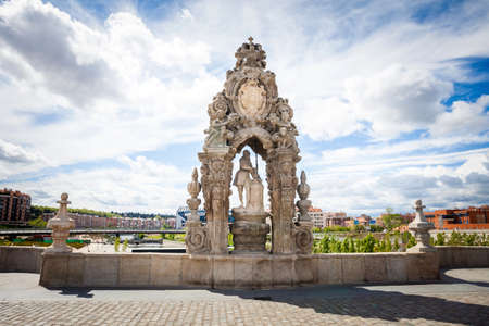 Madrid, Spain - May 5, 2012: Sculpture on Toledo Bridge over Manzanares River, Madrid, Spain. It was built in XVII century.のeditorial素材