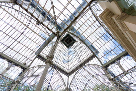 Madrid, Spain - May 6, 2012: Crystal Palace (Palacio de cristal) cupola interior view in Retiro Park, Madrid, Spain.のeditorial素材