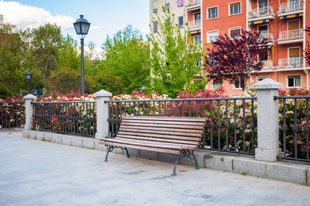 Bench in front of a typical residatial building in La Latina, Madrid, Spainのeditorial素材