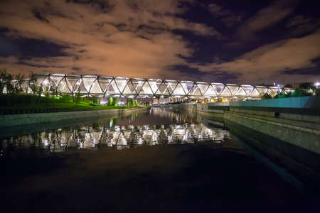 Madrid, Spain - May 5, 2012: Arganzuela Bridge illuminated on a spring night and Madrid Rio Park, Madrid, Spainのeditorial素材