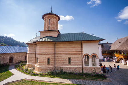 Brasov, Romania - Septemper 9, 2012: Tourists visiting the old orthodox monastery from Polovragi, Romaniaのeditorial素材