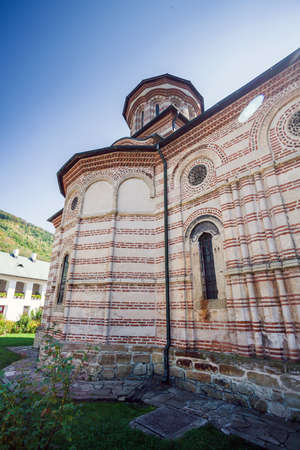 Cozia Romania  Septemper 2 2012: Tourists visiting Cozia monastery church  housing the tomb of Mircea the Elder Romaniaのeditorial素材