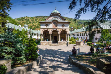 Cozia Romania  Septemper 2 2012: Tourists visiting Cozia monastery church  housing the tomb of...