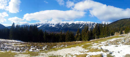 Panoramic view of Mount Piatra Craiului on winter, part of the Carpathian Range from Romania 