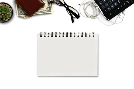 White office desk with US Dollars , calculator, wallet, and supplies. Top view with copy space.の写真素材