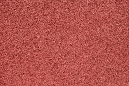 Concrete wall red textured for background.