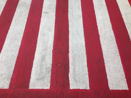 White and red old cement floor texture for background.の写真素材