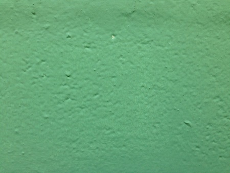 Old green cement wall texture for background.の写真素材
