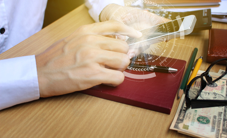 Man use smartphone in home office , Technology Circle on smartphone.の写真素材