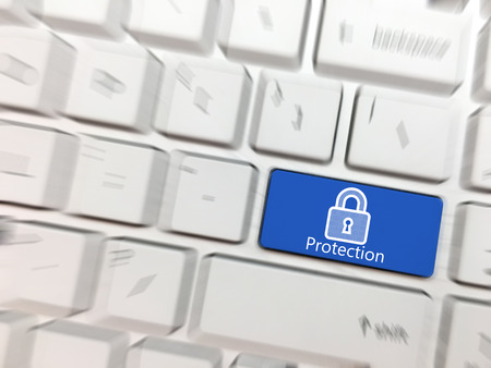 Computer keyboard enter button with security system and symbol.の写真素材
