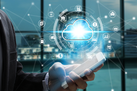 Businessman hand use smartphone with virtual cloud computing icon over the Network connection, Cyber...