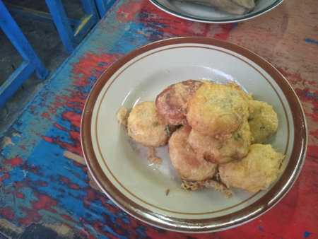 a plate of potato fritters served on a plate ready to eatの写真素材