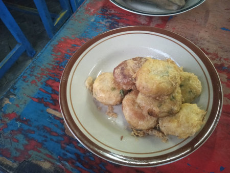 a plate of potato fritters served on a plate ready to eatの写真素材