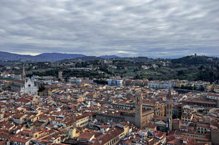 Aerial view at Ponte Vecchio in Florence, Italian region of Tuscany, Italyの写真素材