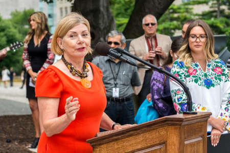 August 24, 2017. Toronto, Canada - Ceremony of raising the Ukrainian flag during the celebration of the Independence Day of Ukraine near Legislative Assembly of Ontario in Toronto, Canadaのeditorial素材
