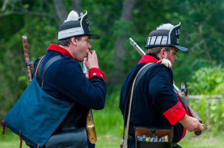 TORONTO â€“ JUNE 17, 2017: Soldiers at the battle of Black Creek revolutionary war re-enactment...