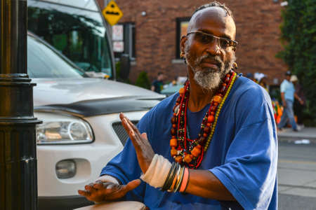 TORONTO, ON, Canada - AUGUST 04: A man plays the drums during the Toronto Caribbean Carnival Grand Parade at Exhibition Placeのeditorial素材