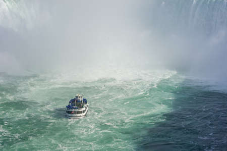 View at boat for tourists near  Niagara Falls from Canadian side at summer timeのeditorial素材