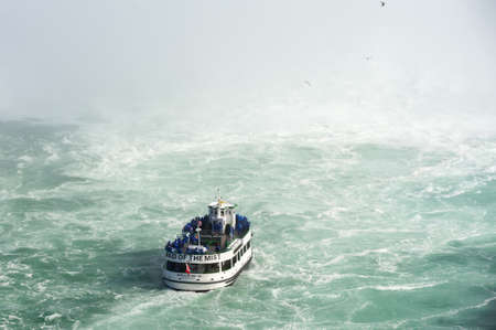 View at boat for tourists near  Niagara Falls from Canadian side at summer timeのeditorial素材